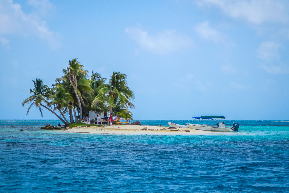 Belize Small Island with palm trees and boat