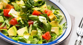 Healthy avocado spinach tomato salad