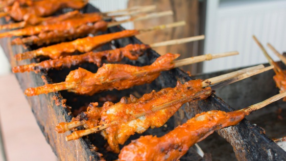 Grilled chicken on the grill roadside of Thailand