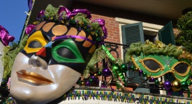 View of a balcony in New Orleans, Louisiana, USA, decorated for carnival celebration of Mardi Gras.