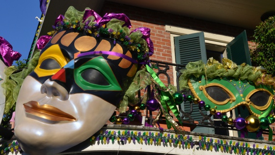 View of a balcony in New Orleans, Louisiana, USA, decorated for carnival celebration of Mardi Gras.