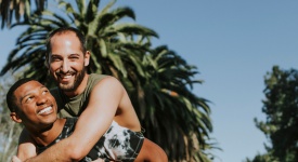 male gay couple outside