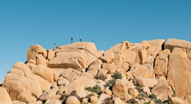 friends hiking on rocks