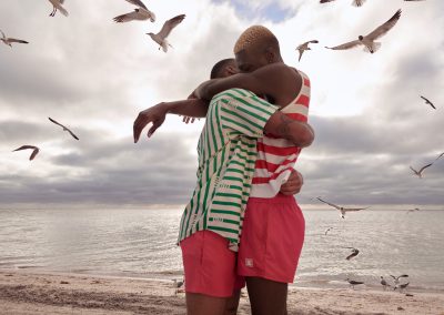Couple hugging at the beach