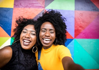 Afro women descent taking selfie photos in the park