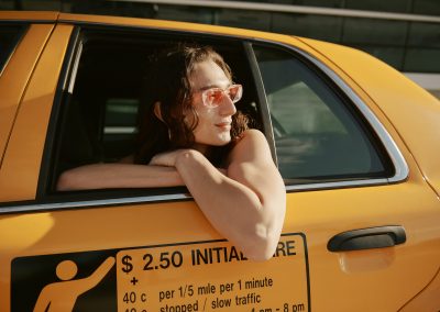 Non-binary person in cab