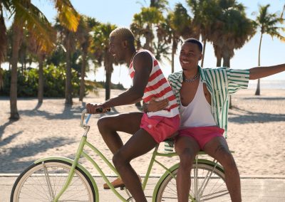 LGBTQ couple on bikes in Miami